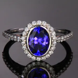 14K White and Rose Gold Oval Tanzanite Ring with Diamond Halo 2.09 Carats