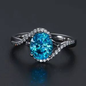 14k White gold Oval Bypass Blue Zircon and Diamond Ring 2.97 Carats