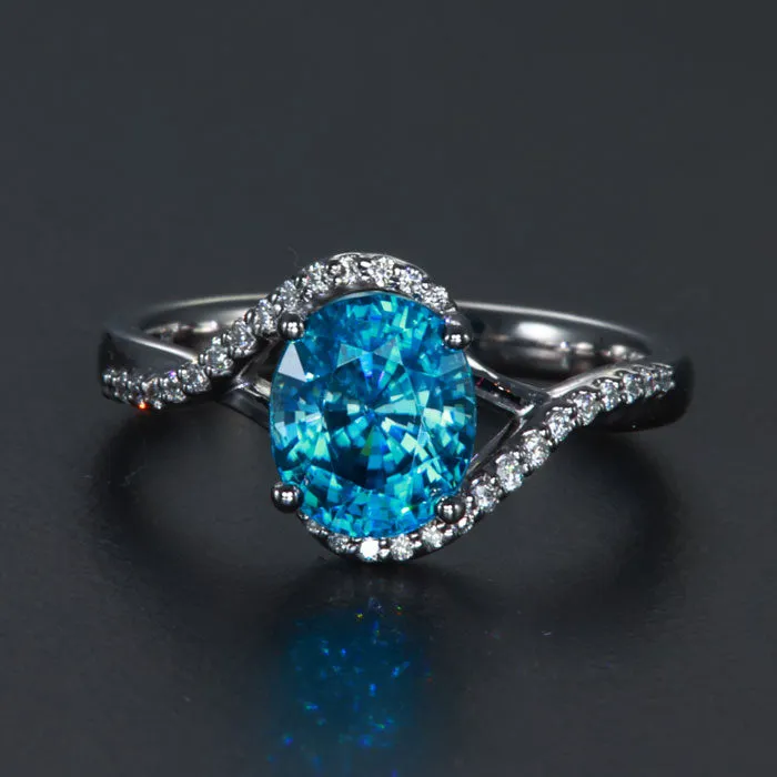 14k White gold Oval Bypass Blue Zircon and Diamond Ring 2.97 Carats