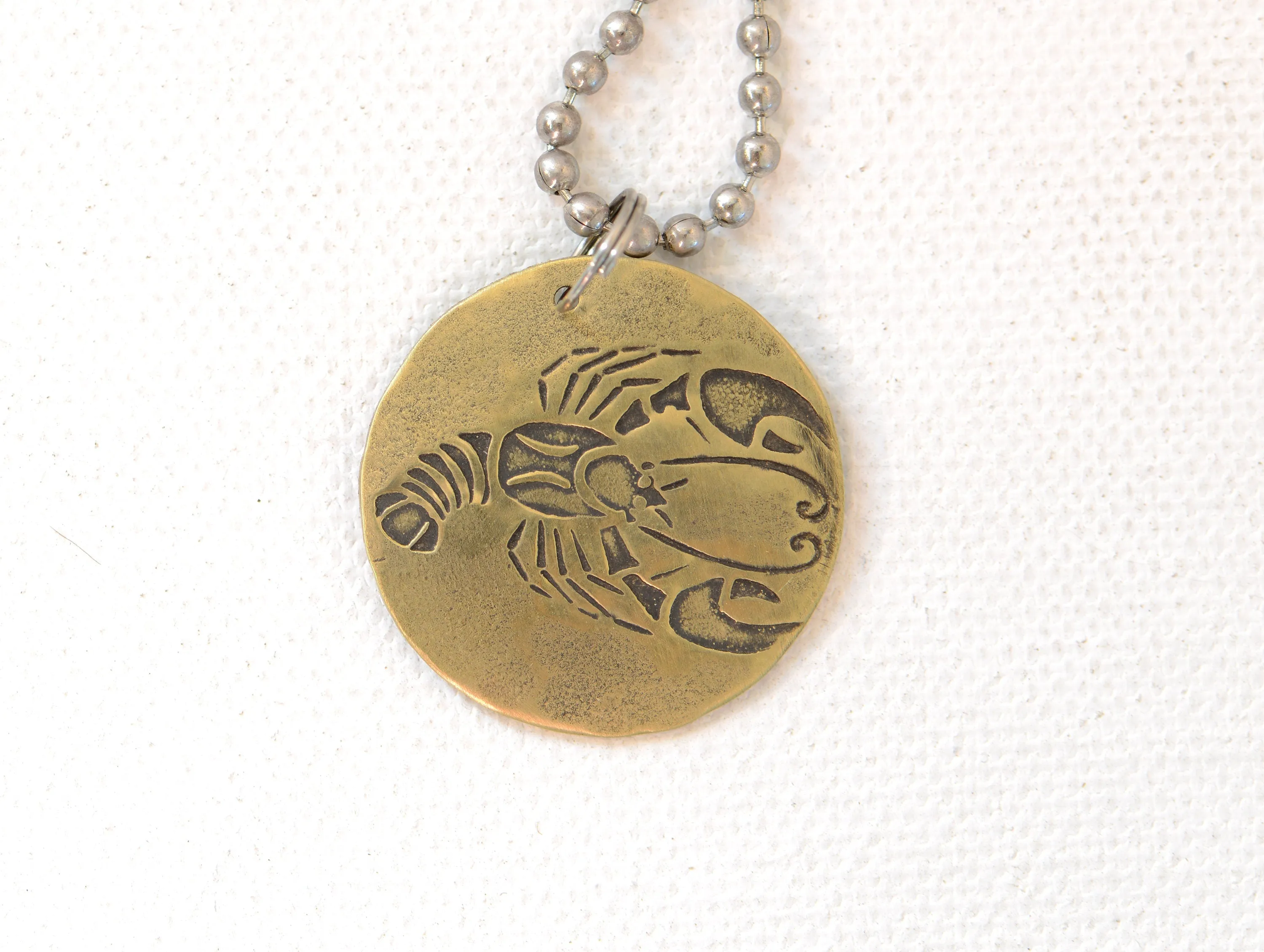 Cancer Zodiac Sign on Brass Disc Necklace