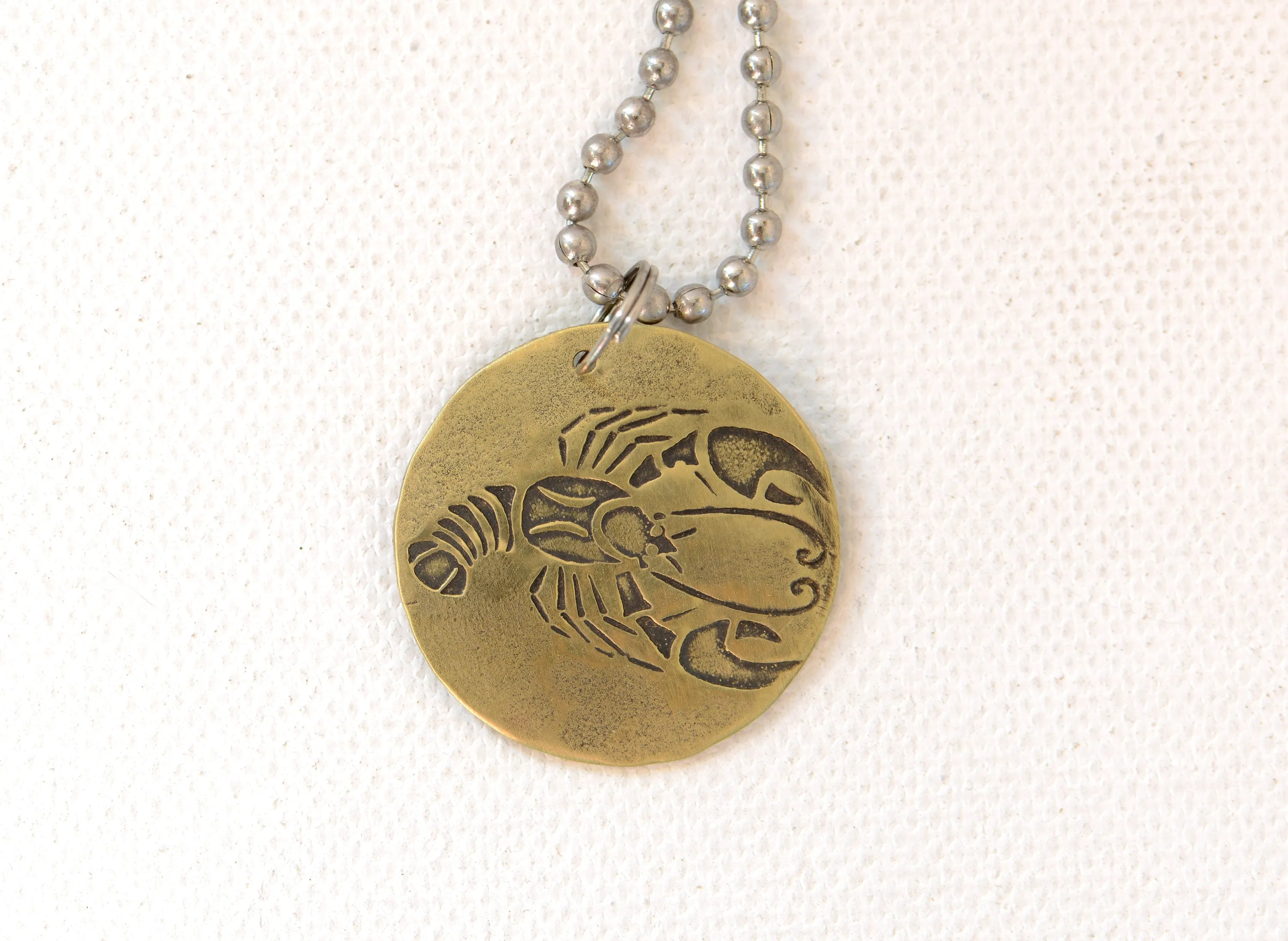 Cancer Zodiac Sign on Brass Disc Necklace