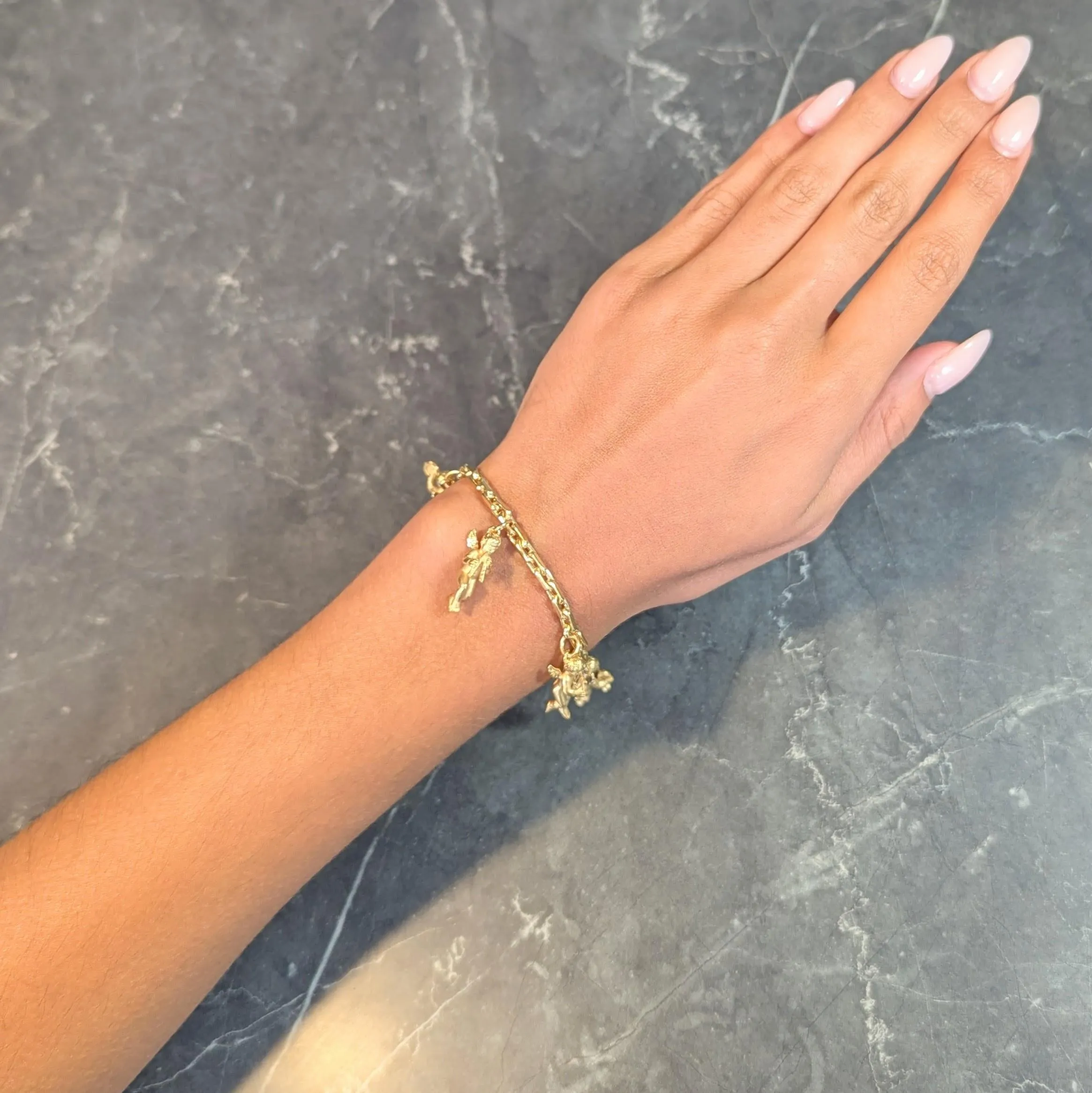Carrera Y Carrera 1990's 18 Karat Yellow Gold Vintage Musical Cherub Charm Bracelet