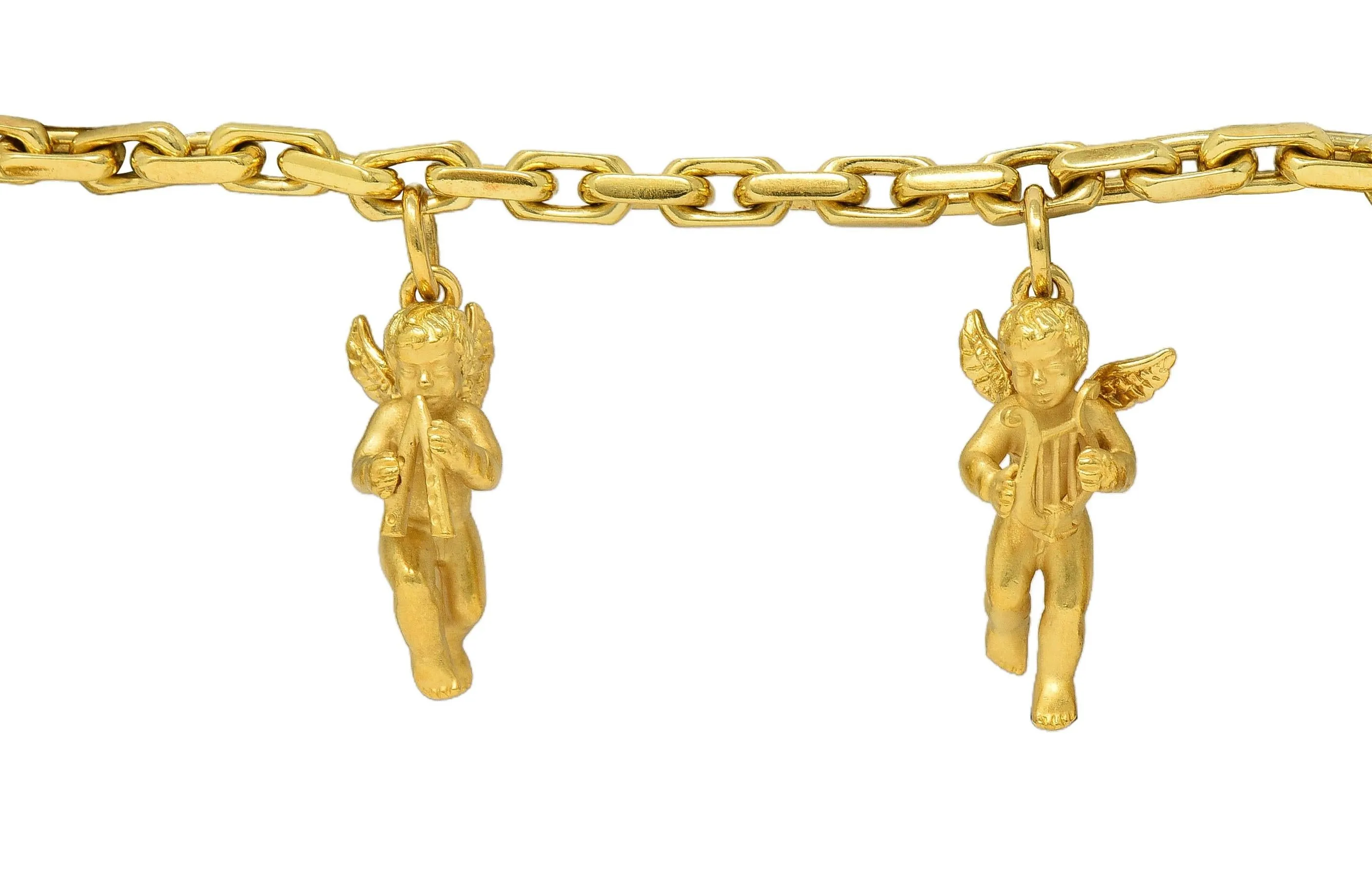 Carrera Y Carrera 1990's 18 Karat Yellow Gold Vintage Musical Cherub Charm Bracelet