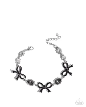 Coquette Caliber - Black - Rhinestone Bow Smoky Teardrop Gem Paparazzi Lobster Claw Bracelet