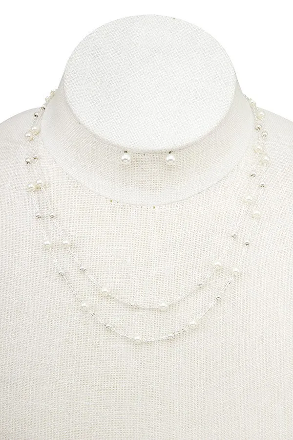 Layered pearl pendant necklace *